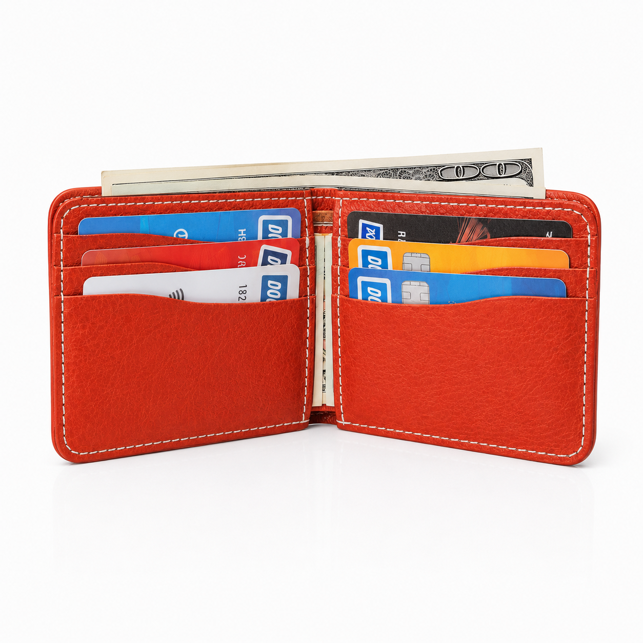 An open red leather bifold wallet with white contrast stitching, showing card slots filled with credit cards and cash, on a clean white background.